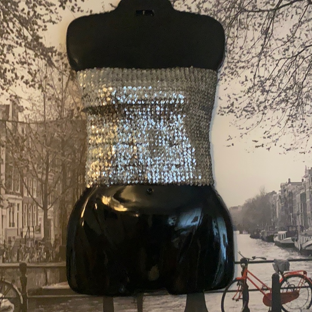 Sequenced top- almost to sexy to sell! Fits like a small.